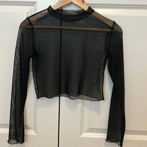 Black long sleeve, see though shirt